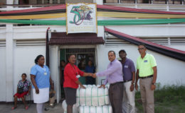 In photo: Silochanie Singh receives the donation from CEO of FFP Kent Vincent while Nurse Shaundelle Inniss-Munroe, Wayne Hamilton and Compton Giddings look on.
