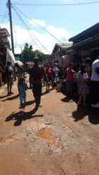 Vendors and shoppers at the Port Kaituma Market Square 