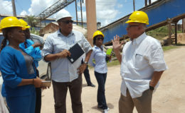 Minister Raphael Trotman (centre) during the tour of Bosai. (Ministry of Natural Resources photo)