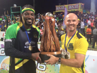 Tallawahs Captain Chris Gayle (left) and coach Paul Nixon with the trophy. (CPL T20 photo)