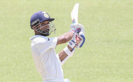 Ajinkya Rahane gathers runs during his unbeaten 108 against West Indies on the third day of the second Test. (Photo courtesy WICB Media) 