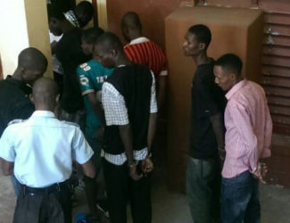 A Group of the Haitian men after they were charged for illegal entry 