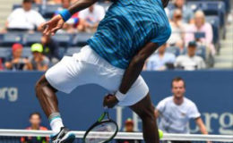 FLASHBACK! Gael Monfils of France hits a net ball between his legs to Jan Satral of the Czech Republic on day three of the 2016 U.S. Open tennis tournament at USTA Billie Jean King National Tennis Center.
