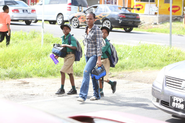 Walking the children to school.