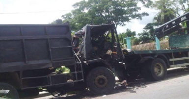 The truck, GGG 645 (at left), after it slammed into the parked motor lorry, GSS 1687 