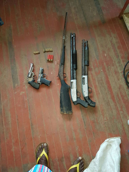 This police photo shows the weapons recovered.