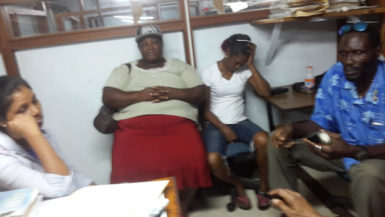  Faces of frustration: Three of the four vendors with whom Stabroek Business spoke on Tuesday evening along with Vendors Union President Eon Andrews.