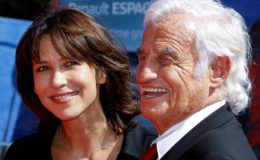 Actor Jean-Paul Belmondo (R) and actress Sophie Marceau (L) pose on the red carpet before the Ceremony of Golden Lion award for lifetime achievement at the 73rd Venice Film Festival in Venice, Italy September 8, 2016. REUTERS/Alessandro Bianchi