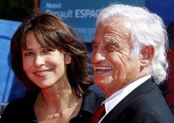 Actor Jean-Paul Belmondo (R) and actress Sophie Marceau (L) pose on the red carpet before the Ceremony of Golden Lion award for lifetime achievement at the 73rd Venice Film Festival in Venice, Italy September 8, 2016. REUTERS/Alessandro Bianchi