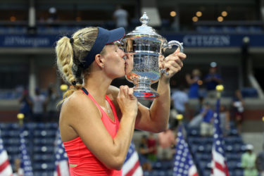 NEW QUEEN OF THE COURTS! Germany’s Angelique Kerber kisses the silverware after her U.S. Open women’s singles final triumph against Karolina Pliskova yesterday. 