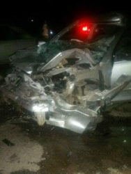 Part of the wrecked vehicle at the scene of the accident