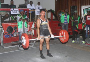 Romario Gonsalves completes a dead lift yesterday.  