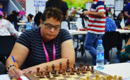 Maria Varona-Thomas (in photo), qualified for the international chess title of Woman FIDE Master at the 42nd Chess Olympiad in Baku, Azerbaijan, two weeks ago. It was the first major title for a female chess player from Guyana. Maria contested the required 11 games on Board One for Guyana and scored victories against fellow board one players from the following countries: Tanzania, Aruba, Chinese Tai Pei, Sudan, Fiji, Barbados and Palestine. She drew with Qatar and Wales. Maria lost against Zambia and Singapore. She placed 21st from a total of 663 women participants at the Olympiad.
