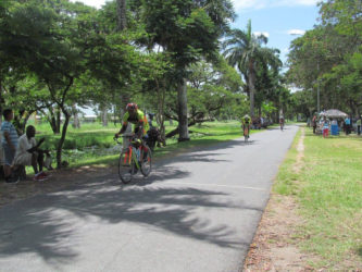 Junior Niles biking to victory ahead of Mark Harris and Paul Choo-We-Nam yesterday at the National Park.  