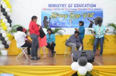 Literacy Officers of the National Literacy Unit performing at the Rap Fest (GINA photo)