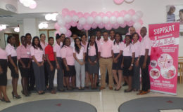 Staff of Scotiabank’s Robb Street Branch at the launch of the cake sale. 