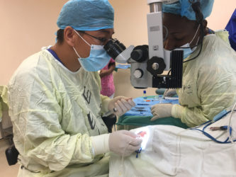 Dr. Li performing the surgery on 94-year-old Foster Mc Kay