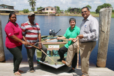  From left: Raywantie Ram (tour guide), Ramesh Shibsahai (boatman), Annette Arjoon-Martins (Project Manager of the Caribbean Aqua Terrestrial Solutions) and Indranauth Haralsingh (Executive Director of the Guyana Tourism Authority).