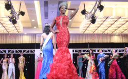 Soyini Fraser was crowned the new Miss Universe Guyana 2016 last evening at the Marriott Hotel, Georgetown, beating out 13 other contestants who were vying for the crown. Ayana Whitehead copped the fourth runner-up spot, while crowd favourite Ashley John was the third runner-up, Ariella Basdeo was second runner-up and Rafieya Hussain was first runner-up. In this Joanna Dhanraj photo, the newly crowned queen strikes a pose after her victory.  