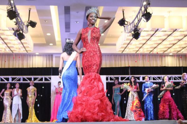 Soyini Fraser was crowned the new Miss Universe Guyana 2016 last evening at the Marriott Hotel, Georgetown, beating out 13 other contestants who were vying for the crown. Ayana Whitehead copped the fourth runner-up spot, while crowd favourite Ashley John was the third runner-up, Ariella Basdeo was second runner-up and Rafieya Hussain was first runner-up. In this Joanna Dhanraj photo, the newly crowned queen strikes a pose after her victory.  