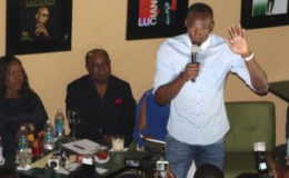 Usain Bolt speaking at the opening of the Ocho Rios franchise. (Picture courtesy loop) 
