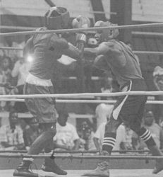 Guyana Defence Force’s Rhondel Douglas and Delroy Nero of the Republican Gym battling it out. (Orlando Charles photo)