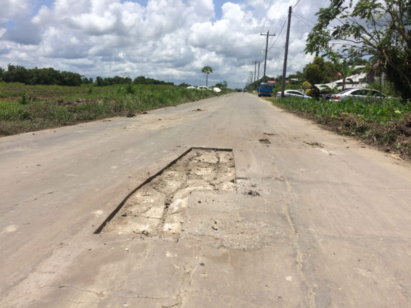  One of the larger holes that were cut in preparation for the road repairs. 