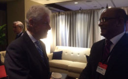Former President Bharrat Jagdeo (right) with former US President Bill Clinton.