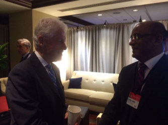 Former President Bharrat Jagdeo (right) with former US President Bill Clinton.