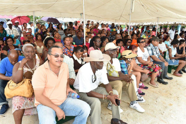 A section of the gathering seated under a tent  (Ministry of the Presidency photo)