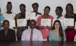 The graduates of The Savings Group Training Initiative along with the project manager, facilitator and the CEO of the Volunteer Youth Corps. Back row (left to right)- Muna Nur, Osmine Williams, Tricia Wharton, Latanna Brandon, Melissa London, Joyann Blair, Antoinette Leslie, Alyce Cameron. Front row (left to right) - Goldie Scott, CEO of Volunteer Youth Corps, Eon Stephens, Facilitator of the project and Jelena Ivic, Women's Entrepreneur Advisor (Cuso International Volunteer) 