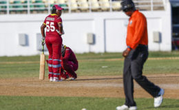 Erva Giddings (standing) stares in disappointment after being given out LBW in the opening ODI against England Women last Saturday. Shemaine Campbelle (stooping) shares in her disappointment. (Photo courtesy WICB Media) 