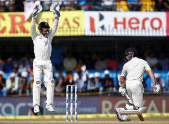 India’s Wriddhiman Saha successfully appeals for the wicket of New Zealand’s Kane Williamson. REUTERS/Danish Siddiqui