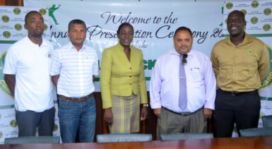 Minister of Sports Nicolette Henry is flanked by officials of the Guyana Cricket Board at the launch of the National Secondary Schools Cricket League at the Georgetown Cricket Club yesterday. (Orlando Charles photo)  