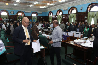 Opposition Leader Bharrat Jagdeo (right) leading the walkout yesterday.