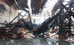 The collapsed interior of the bond which was ravaged in Monday evening’s fire at the Gafoors Houston Complex. 