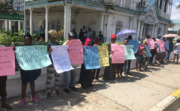 Vendors protesting yesterday in front of City Hall for City Council to have a formal meeting with the Guyana Market Vendors Union.
