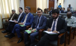 Executives of the IDB. From right to left are Saifullah Abid, Senior Country Programme Manager; Anise Terai; Vice President, Sayed Aqa and Special Advisor to the Vice President, Mohammad Alsaati, seated with Junior Finance Minister Jaipaul Sharma.
