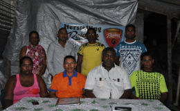 Newly elected President of Herstelling Raiders FC Devnon Winter (seated 2nd left) being flanked by members of his executives. Seated from right to left are Quazim Yussuf, Kristopher Roberts and Ms. Parbattie Winter while standing from right are Roy Persaud, Uniss Yussuf, Richard Doodnauth and Anola Braithwaite.  