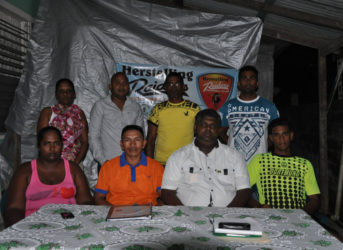 Newly elected President of Herstelling Raiders FC Devnon Winter (seated 2nd left) being flanked by members of his executives. Seated from right to left are Quazim Yussuf, Kristopher Roberts and Ms. Parbattie Winter while standing from right are Roy Persaud, Uniss Yussuf, Richard Doodnauth and Anola Braithwaite.  