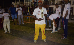 Uniss Yusuf shows off his MVP trophy for a match winning innings of 53.