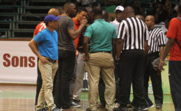 Power Meeting-Director of Sports Christopher (3rd from left) Jones in discussions with members of the Suriname and Guyana Management teams as well as the officials following the discovery of the broken backboard caused by a dunk from Suriname’s Xavier Nassy at the Cliff Anderson Sports Hall