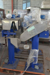 A Shell Remover that will help prepare the coconut for the production process.