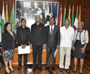 From left are Carol Corbin, Sukrishnalall Pasha, President David Granger, Ivor English, Nanda Kishore Gopaul and Emily Dodson at the Ministry of the Presidency yesterday after the swearing in ceremony. (Ministry of the Presidency photo) 