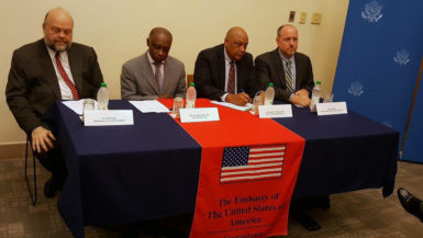 From left to right are United States Ambassador Perry Holloway, acting Prime Minister Carl Greenidge, Minister of Natural Resources Raphael Trotman and Carter Center Representative Jason Calder. 