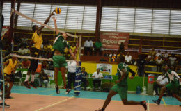 Volleyball action between defending champs Guyana and Suriname on yesterday’s opening day of the 2016 Inter Guiana Games  played at the National Gymnasium.