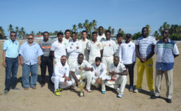WE ARE THE CHAMPIONS! Guyana Cricket Board/Cricket Guyana Incorporated three day Franchise League champions Lower Corentyne bask in the moment after winning the inaugural tournament which ended yesterday. At left is GCB secretary, Anand Sanasie and next to him is GCB president Drubahadur. (Orlando Charles photo)