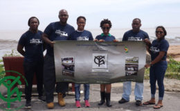 Members of Team CYEN-Guyana during the International Coastal Cleanup Activity 2016 at the Kingston Seawall. 