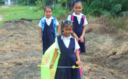 Schoolgirls on their way home on Friday at Rockstone in Region 10 (Upper Demerara/Upper Berbice) (Photo by Mariah Lall)