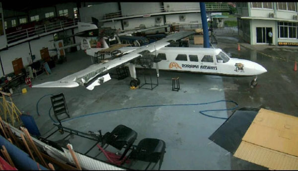 The Britten Norman Trislander aircraft on which the explosion occurred in the Roraima Airways hangar. The damaged wing is visible at left.